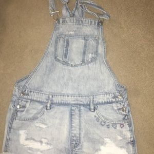 Light Blue ripped overalls